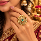 Emerald Mehfil antique gold adjustable statement ring worn on a woman's hand
