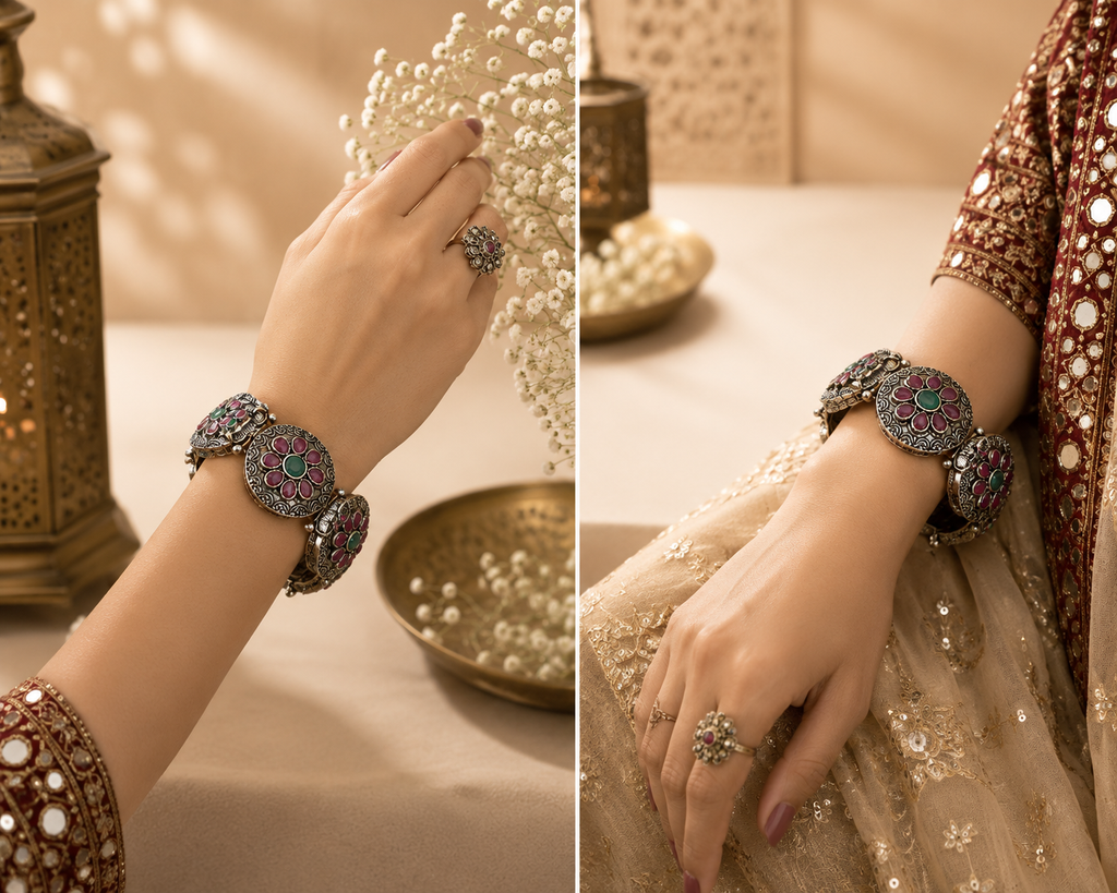 Oxidised ruby green floral disc folding kada worn on wrist