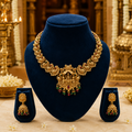 South Indian Lakshmi Temple Choker Necklace Set with Matching Jhumka Earrings in Traditional Gold Finish - front view