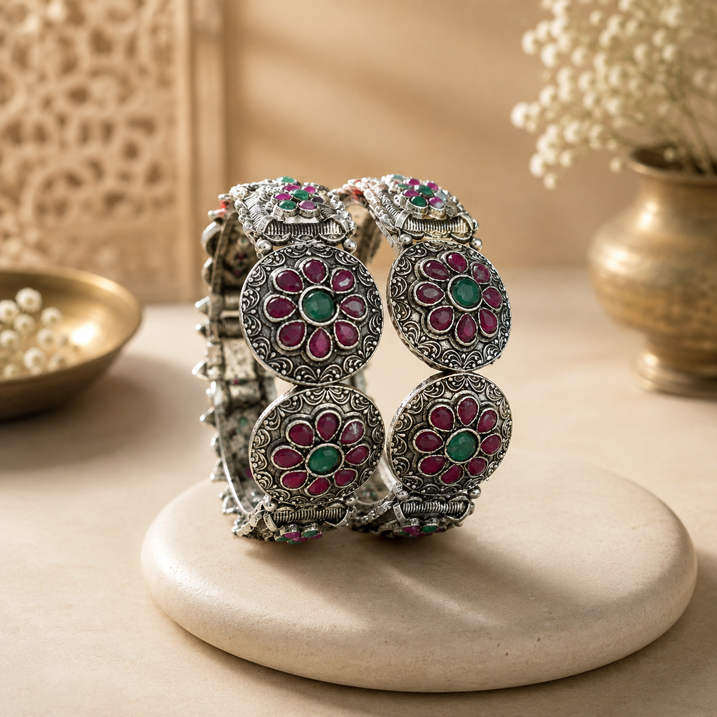 Oxidised ruby green floral disc adjustable folding kada - front view