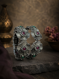 Oxidised silver floral ruby stone adjustable folding kada - front view