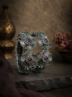 Oxidised silver floral ruby stone adjustable folding kada - front view